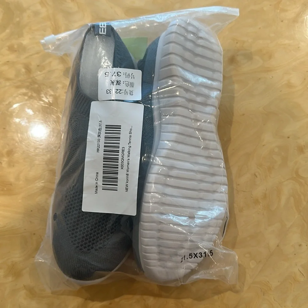 7W NWT-Gray and White Slip-On Sneakers with Knit Upper